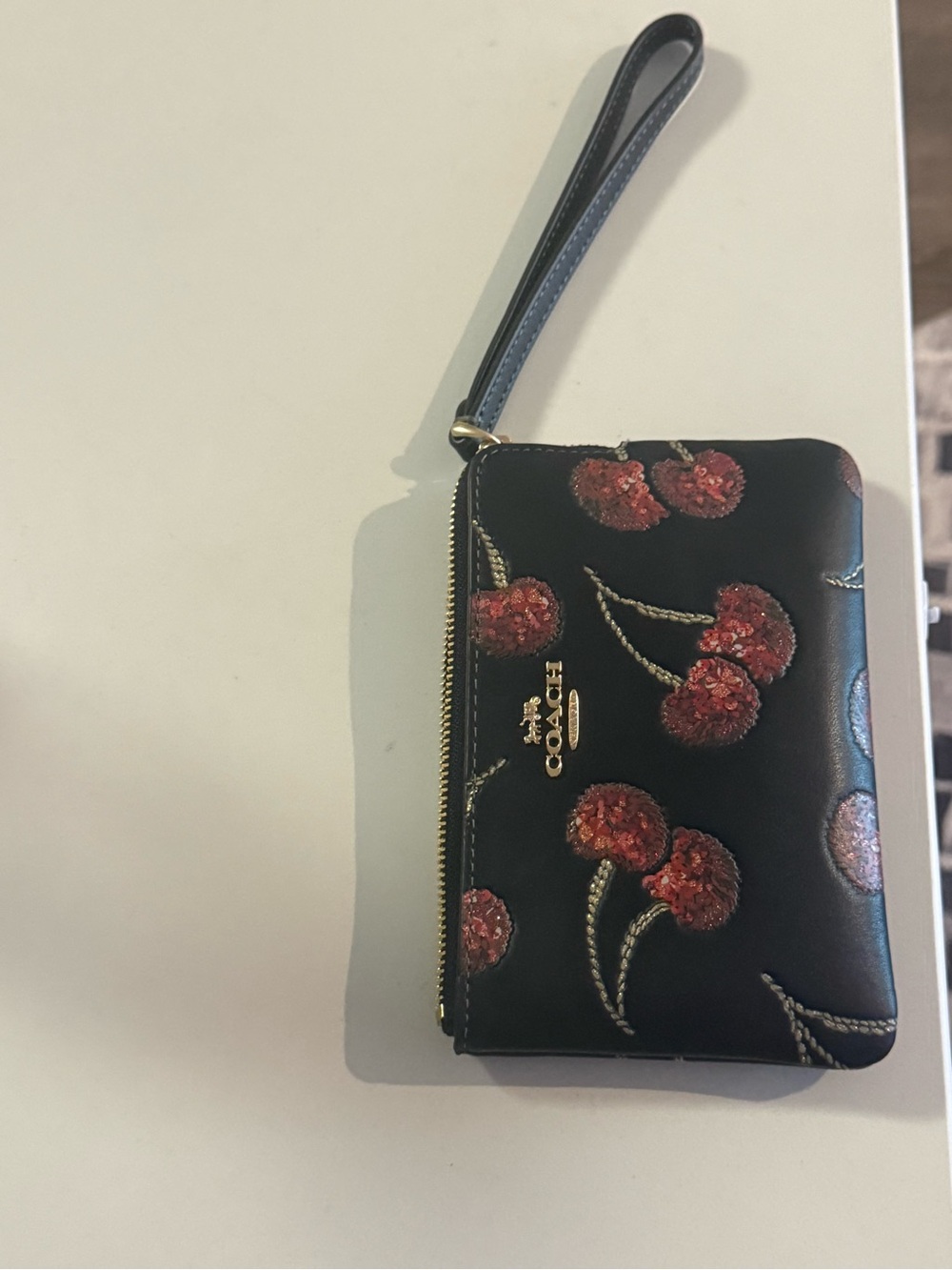 Coach Black Leather Wristlet with Red Cherry Motif